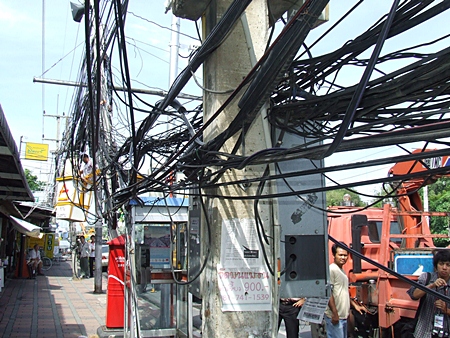 The city has restarted an attempt to clean up the unsightly mess of unused wires around town, embarrassing local utility company management who were told to do this themselves a long time ago.